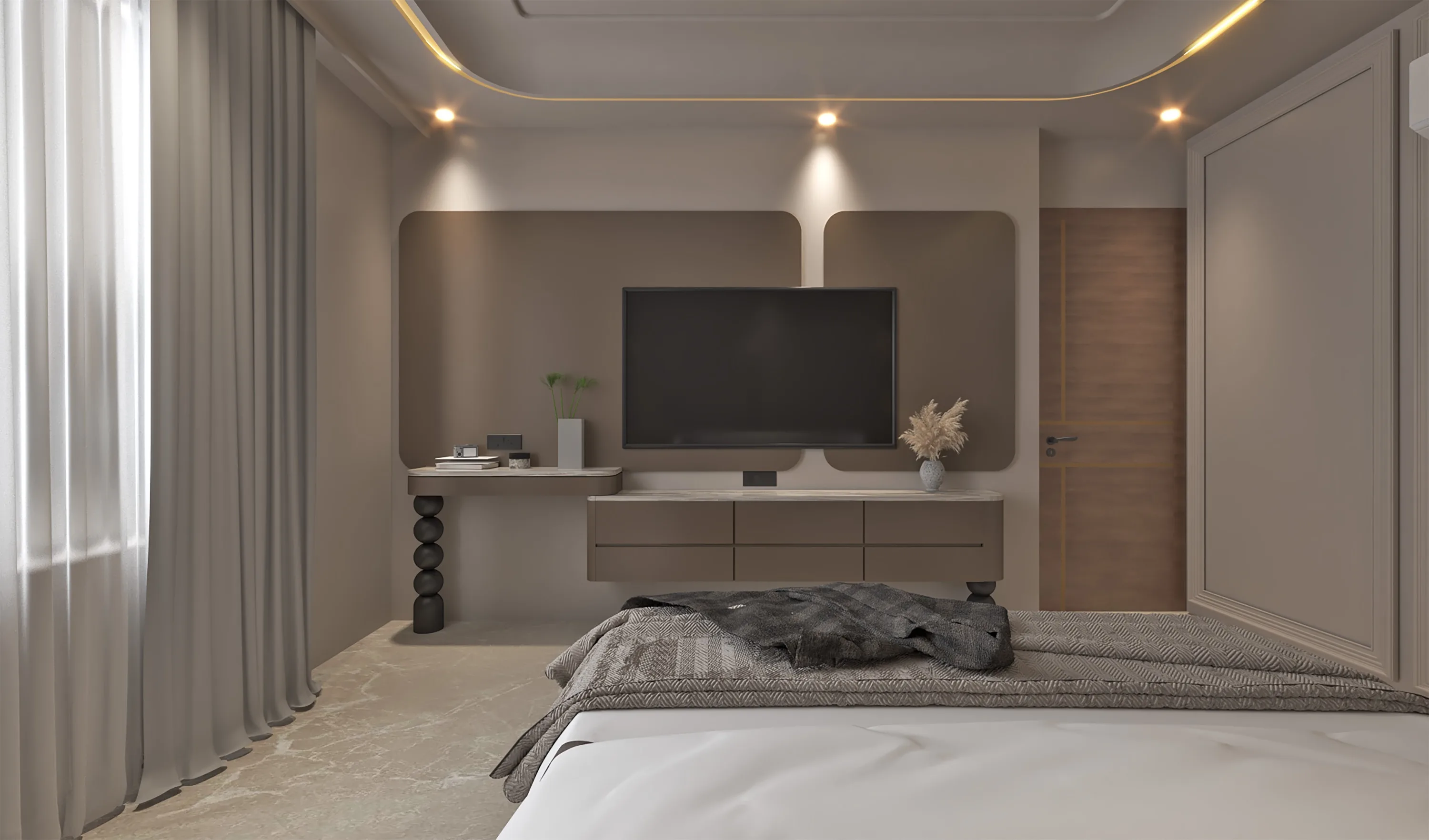 Bedroom TV wall in soft grey panels, with a floating desk and a turned-wood lamp column