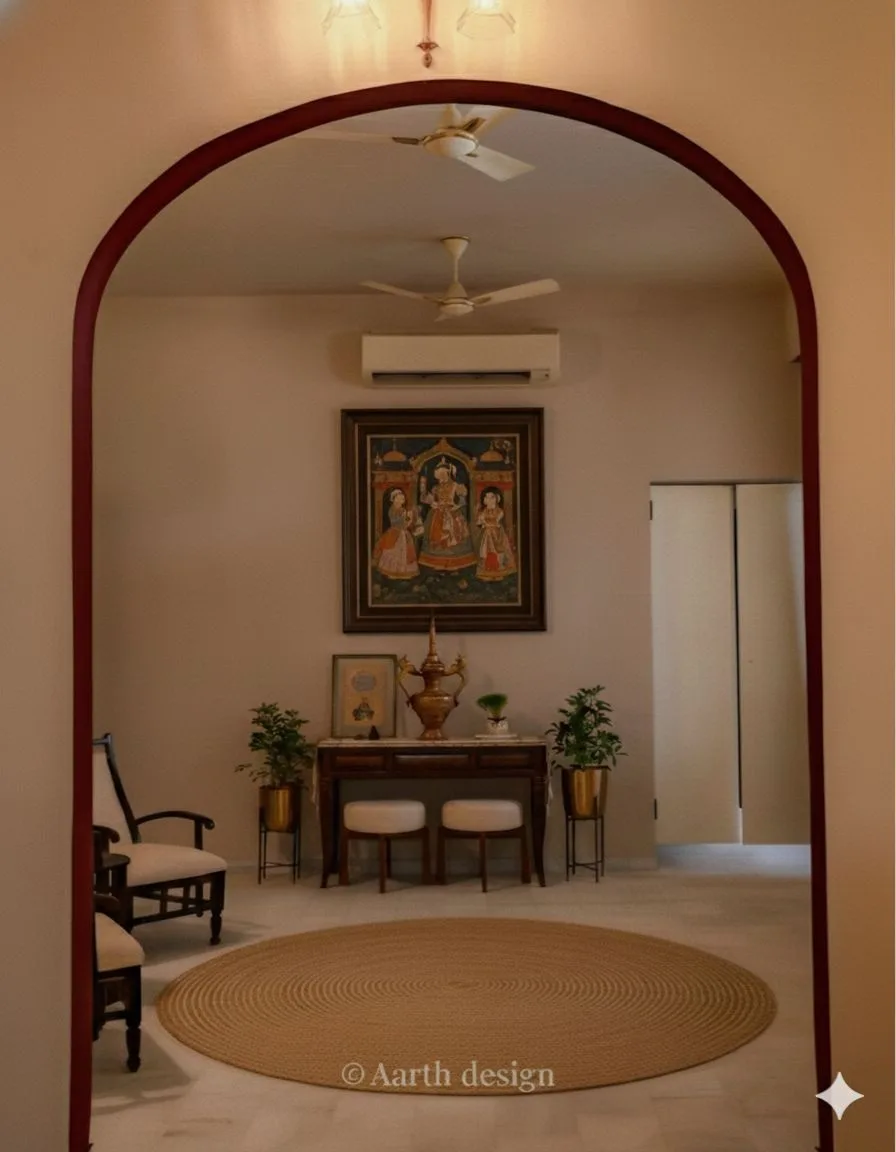 View through the entrance archway to a console table and miniature painting beyond