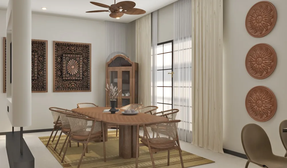 Dining room with a round timber table, cane chairs and carved terracotta plates on the wall