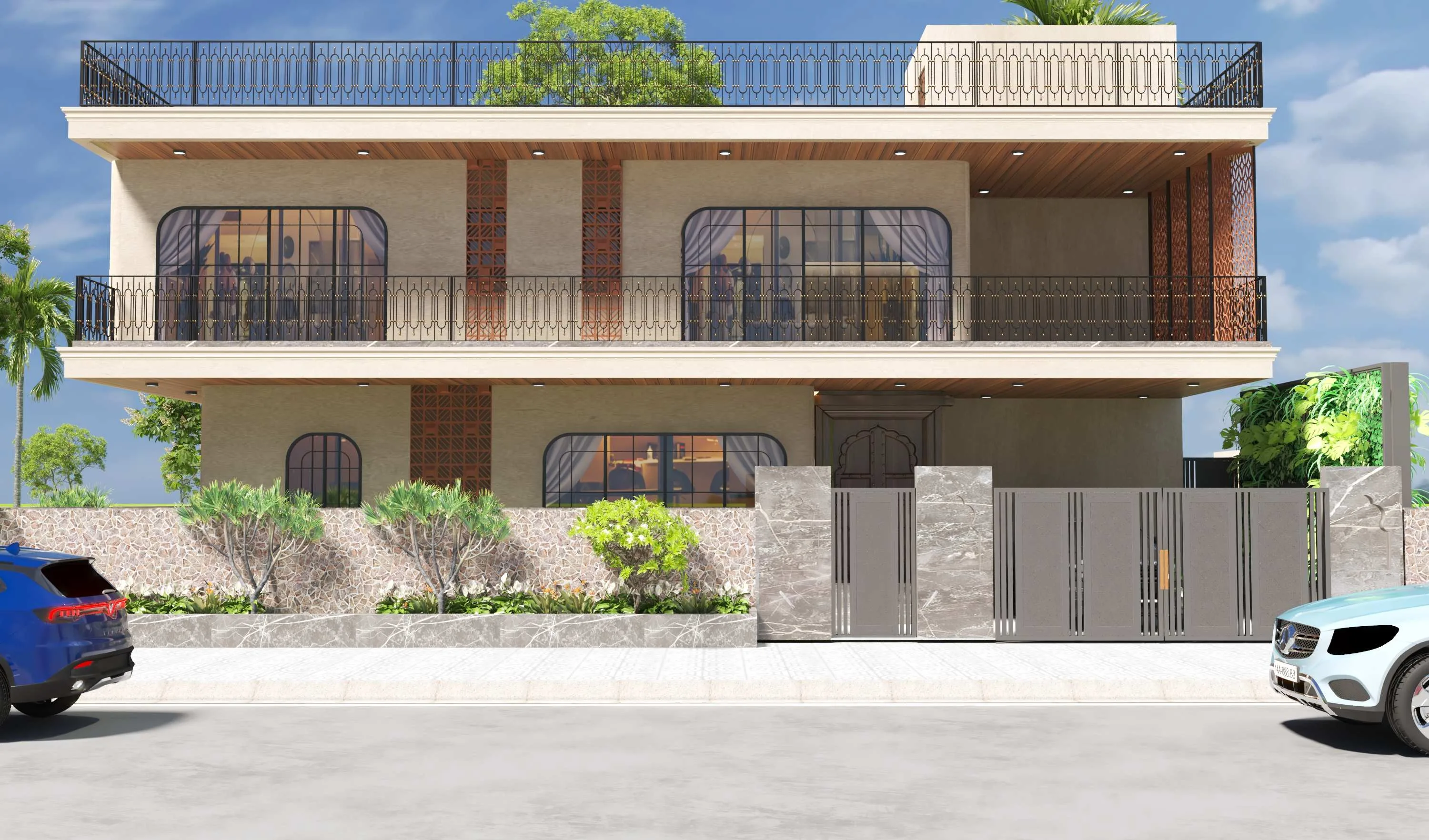 Front elevation of the Bikaner property at dusk, with balconied upper floors and a jaali-screened facade